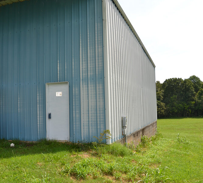 6.18 Residential Acres in City of Sweetwater w/ 2,400 sf Metal Warehouse Building