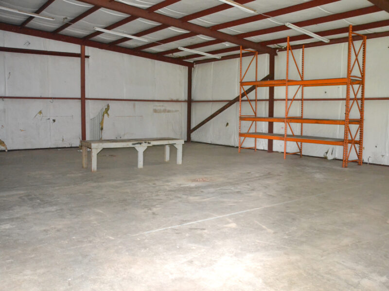 6.18 Residential Acres in City of Sweetwater w/ 2,400 sf Metal Warehouse Building